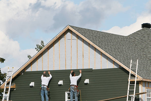 Professional Emergency Siding Repair technician working in Newport, OH